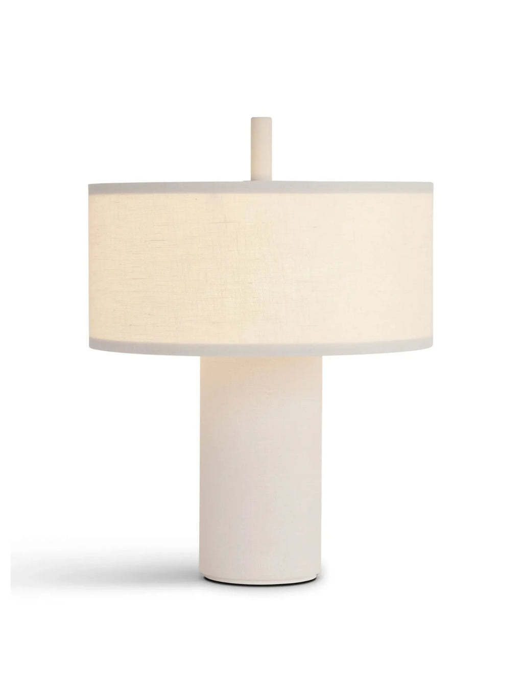 New Works Margin Portable Table Lamp: A minimalist off-white fabric lamp with a cylindrical base and drum shade, featuring a subtle vertical accent, displayed on a white background. Perfect for enhancing modern decor.