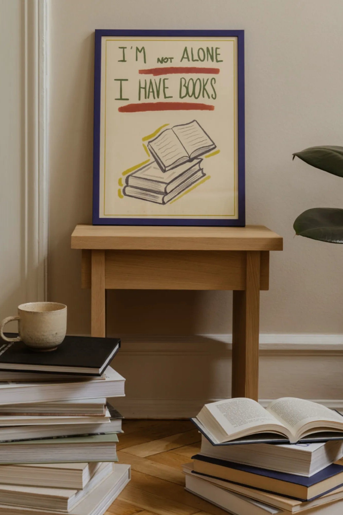 Child holding I Have Books and happily flipping through the pages