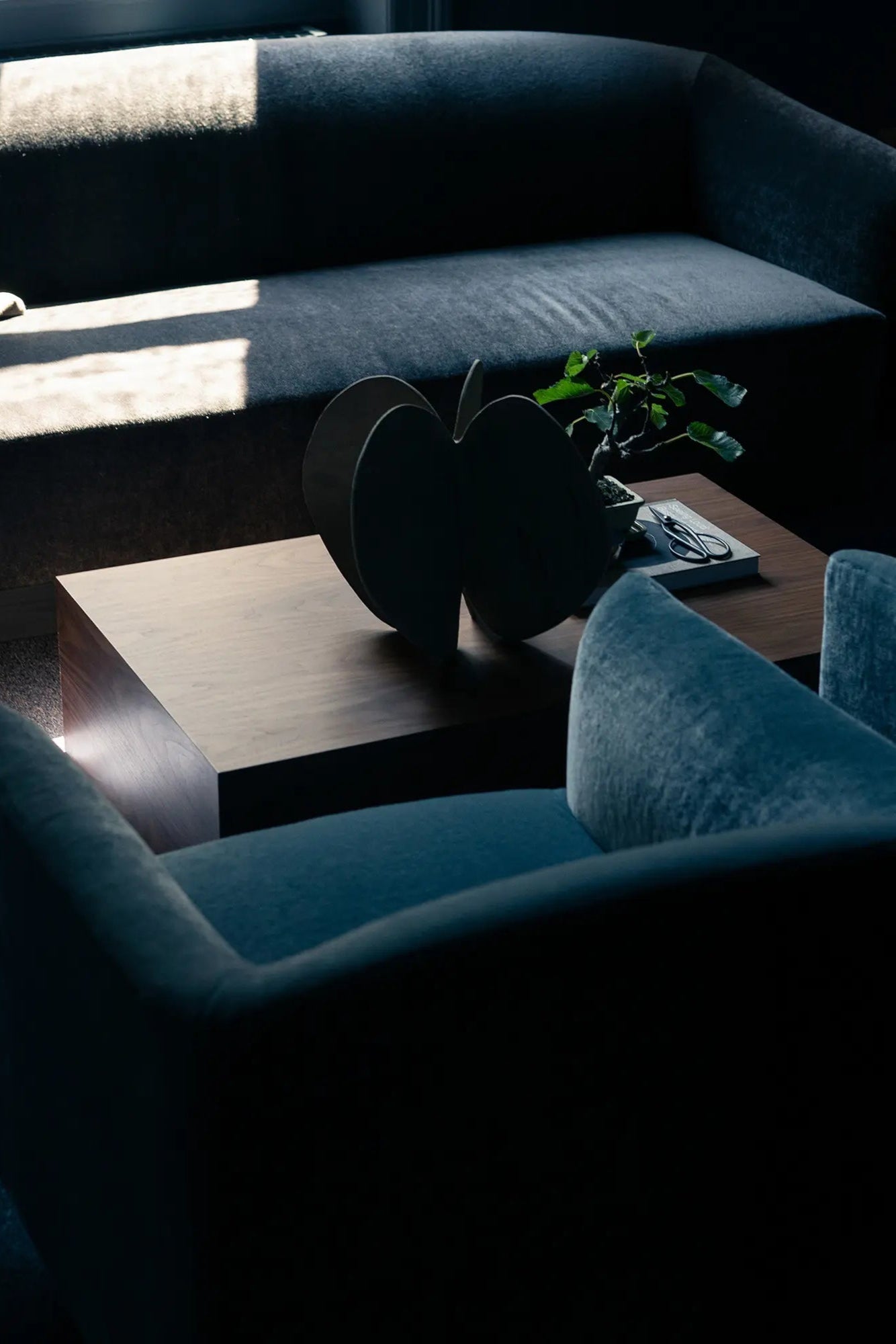  Contemporary coffee table in a rich finish, featuring a practical drawer