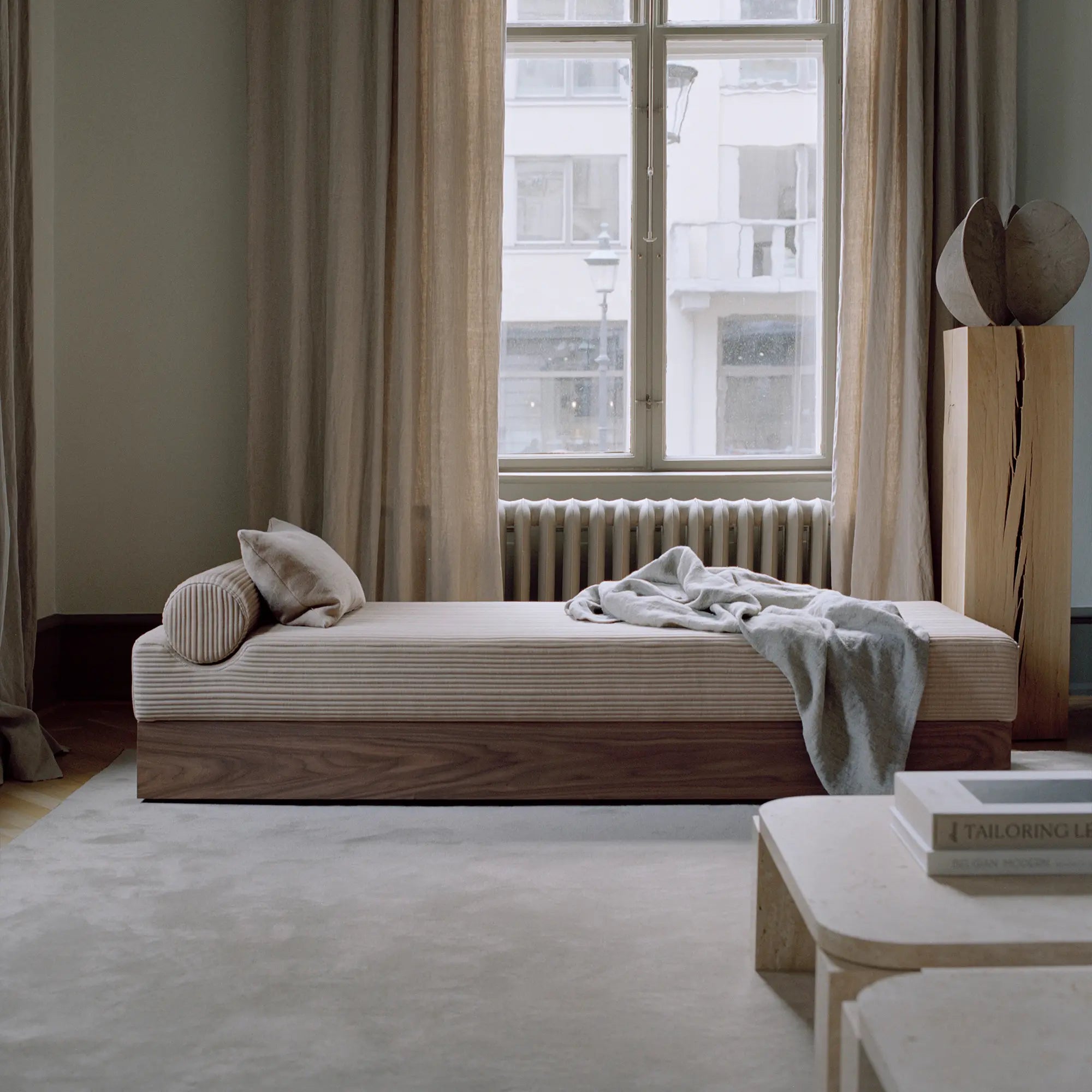  Versatile daybed with convertible chaise and hidden storage space 