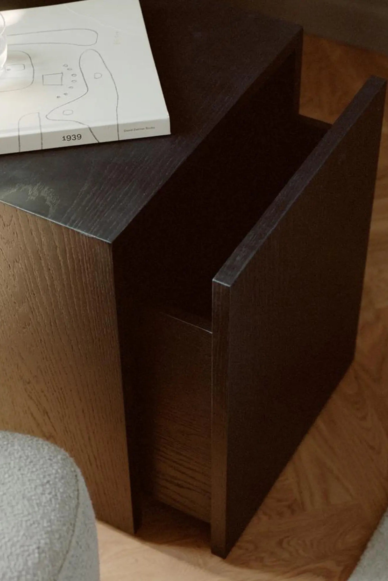  Functional nightstand with ample storage space and sleek design 