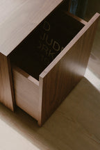  Minimalist nightstand with clean lines and a compact design for small spaces