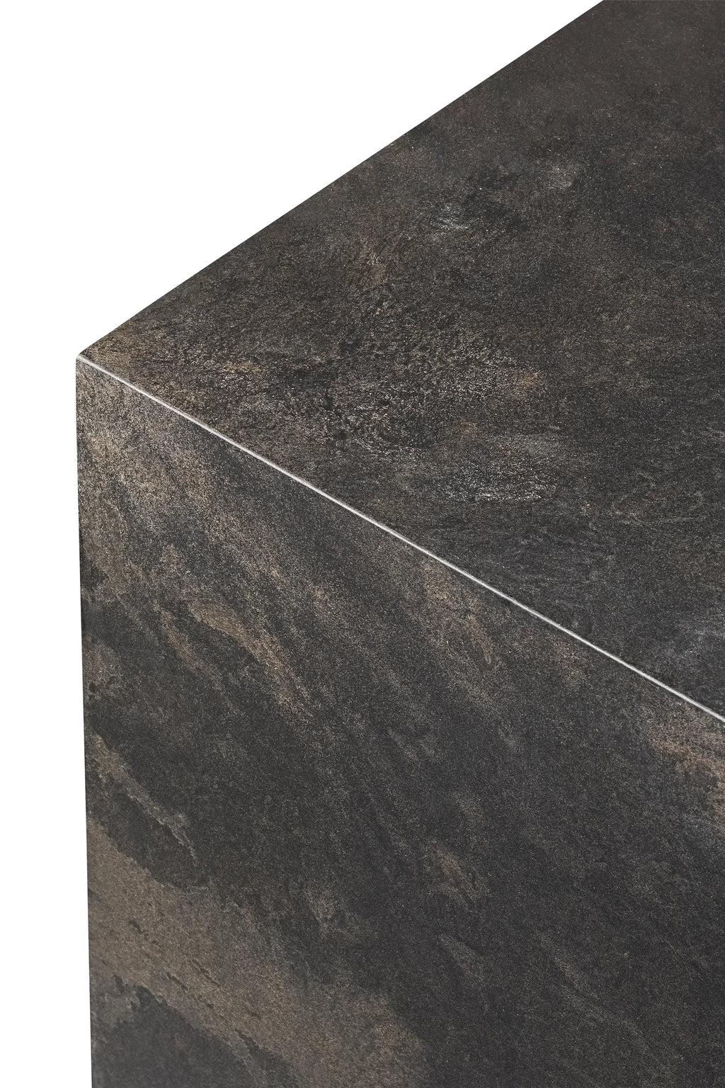 Mater Cube, a close-up detail of the dark brown cube, showcasing its rich, multi-tonal textured surface with intricate patterns, presented on a crisp white background.