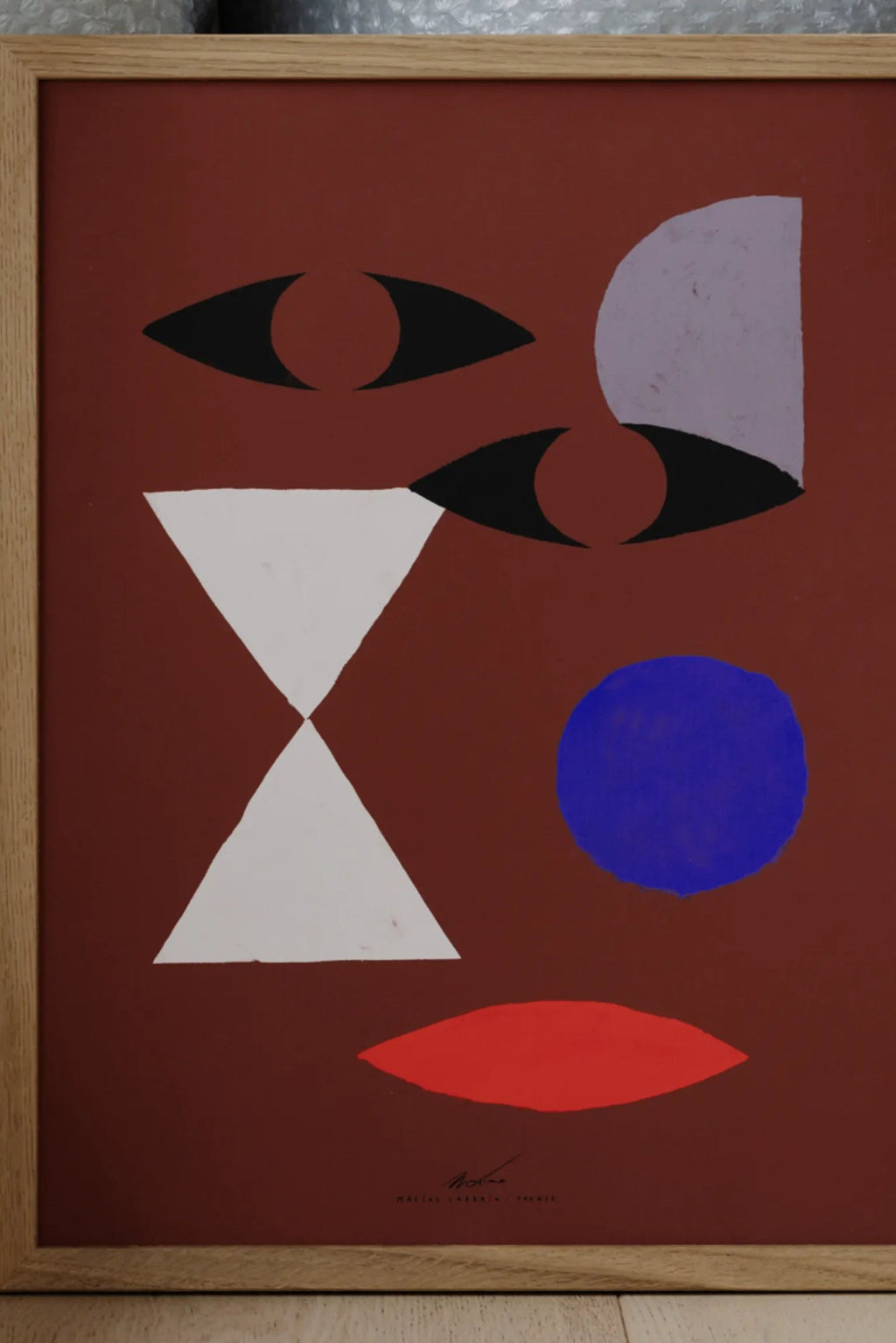 Abstract Face artwork with bold lines and vibrant colors on canvas