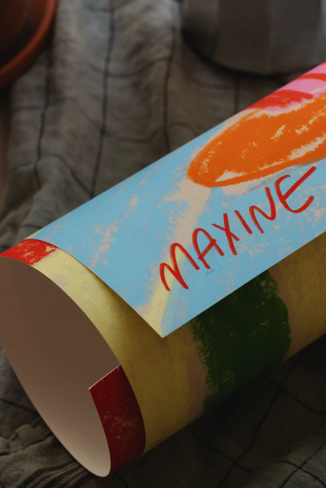 Bialetti Moka Pot next to a pile of fresh clementines on a wooden table