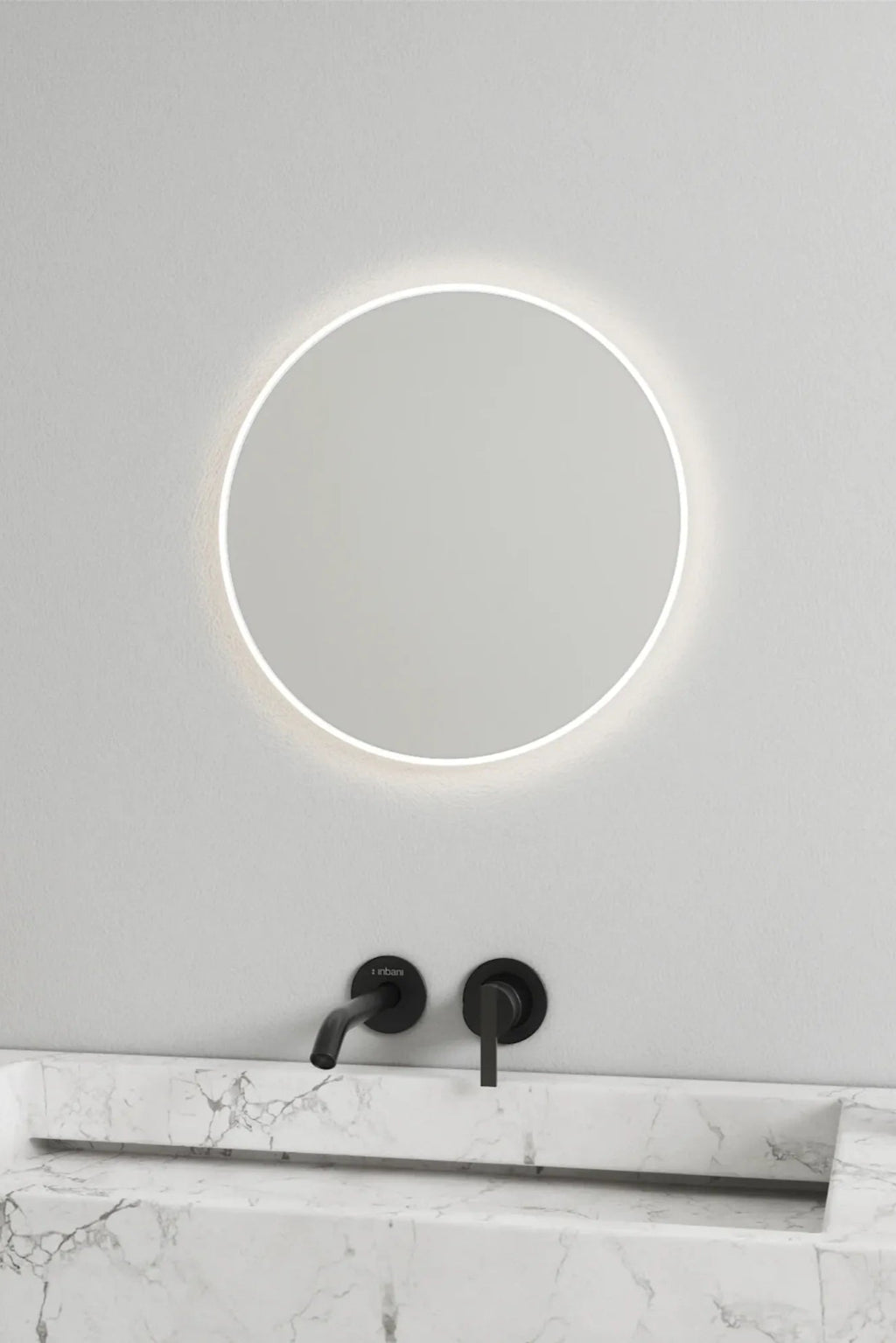 Round mirror featuring soft, warm lights for a cozy atmosphere