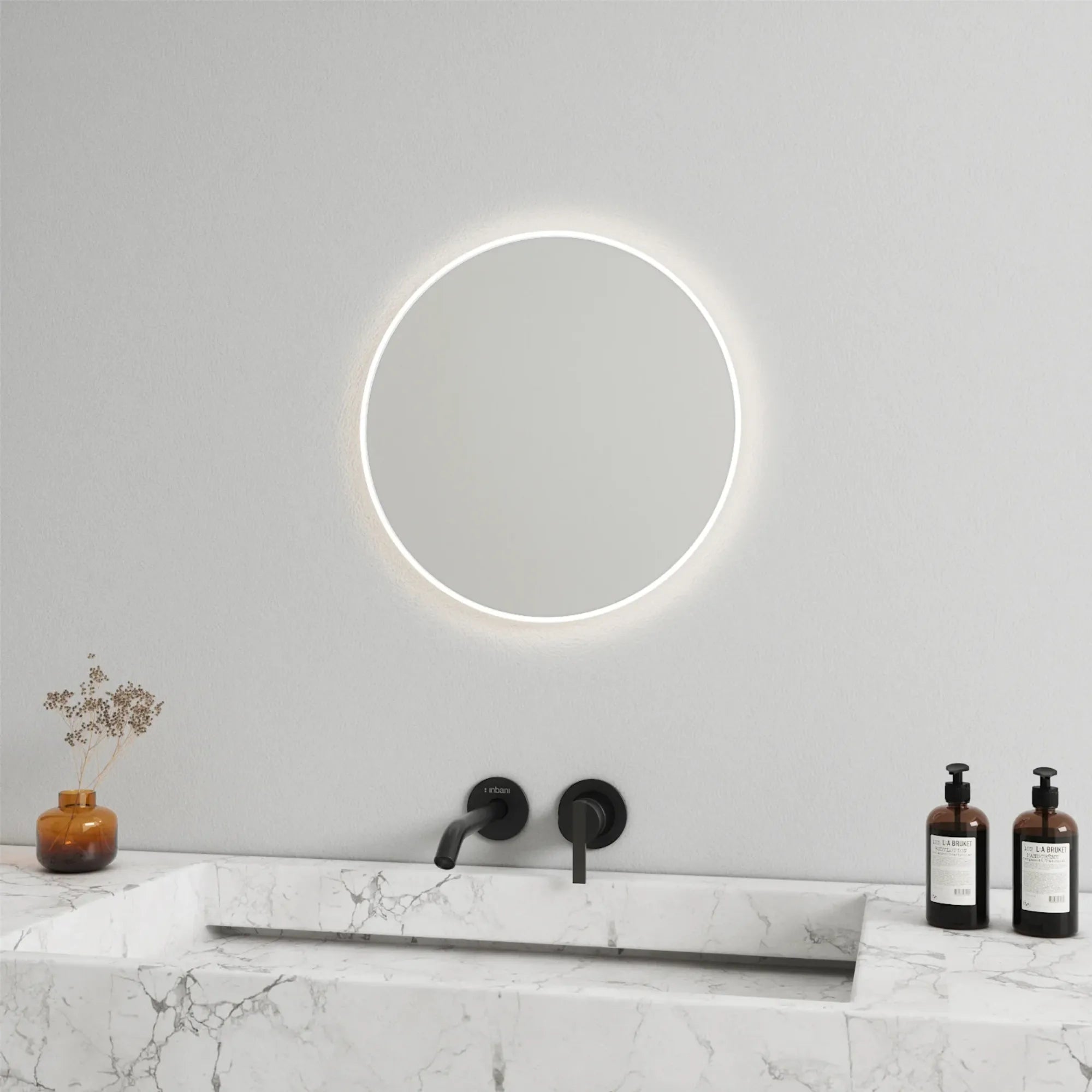 Round mirror featuring soft, warm lights for a cozy atmosphere