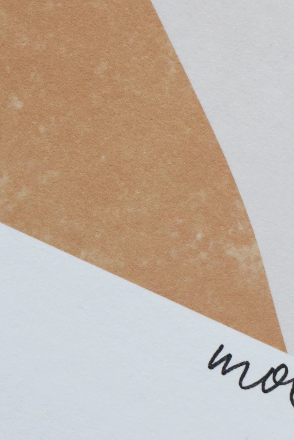 The Poster Club In Motion, a minimalist abstract art print showcasing a large, warm sandy beige geometric shape with a subtle textured appearance set against a crisp white background, accented by a partial black script signature.