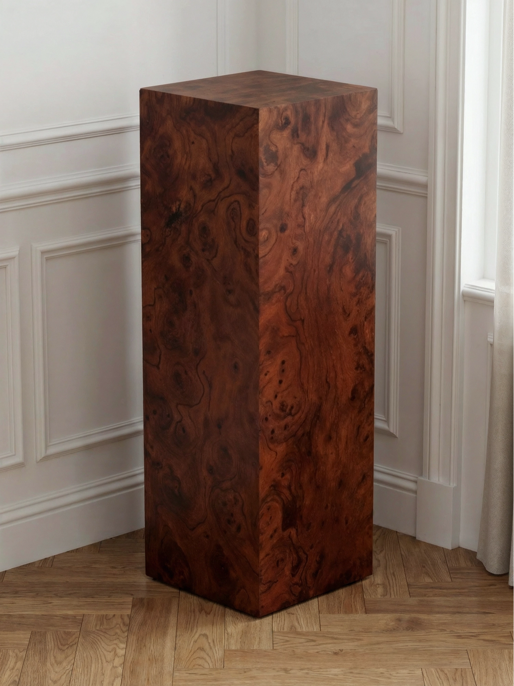 TCL Studios Monolith Walnut Burlwood Display Column, a tall, rectangular modern pedestal featuring a luxurious dark brown burlwood veneer that showcases rich reddish-brown tones and a distinctive, highly figured grain pattern. This elegant and sturdy display column is perfect as an accent table, sculpture stand, or plant stand for contemporary living rooms, entryways, or sophisticated gallery settings.