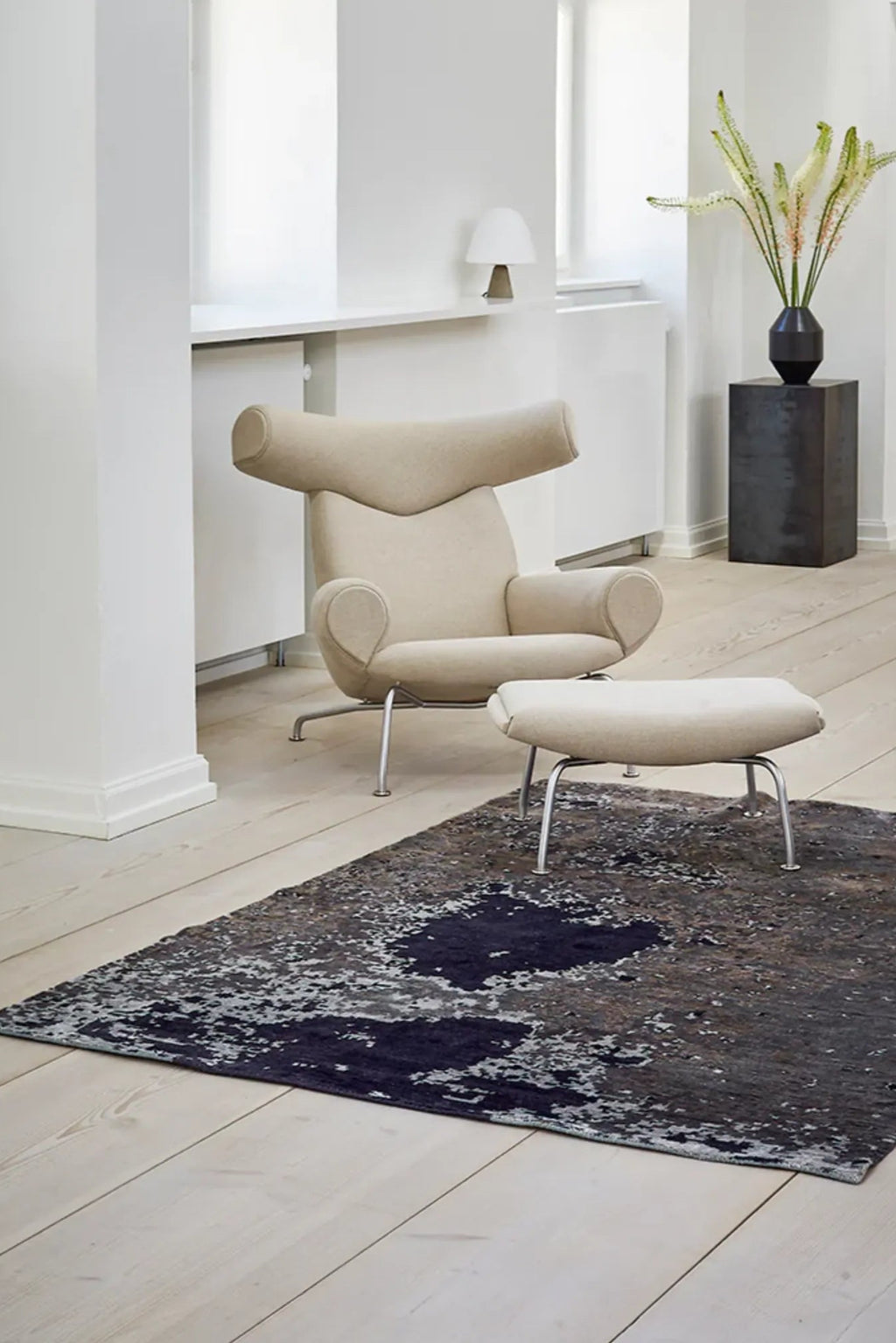  Elegant moon-shaped rug in a calming shade of blue, perfect for adding a tranquil touch to any room