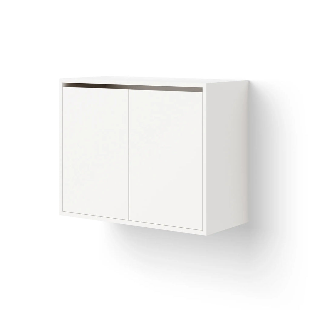 Large standing cabinet with doors and ample storage space for home or office use