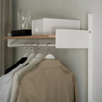 Versatile Wardrobe Shelf 1 used in a bedroom, providing convenient and practical storage 