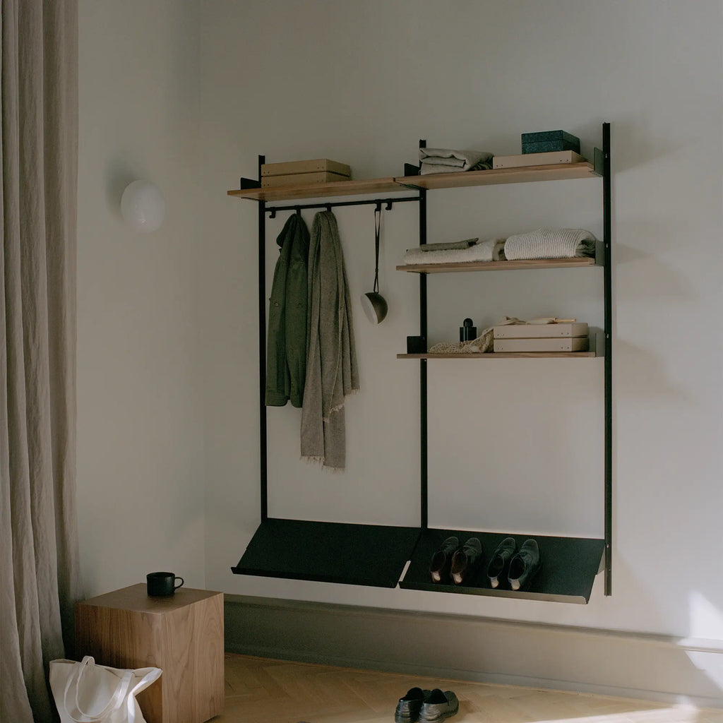  Close-up of sturdy metal frame and adjustable shelf brackets in wardrobe organizer