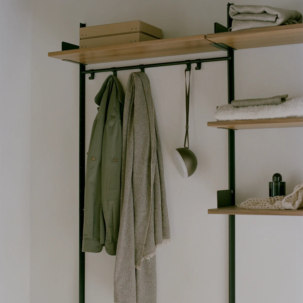  Modern and versatile closet organizer with three shelves and sleek white finish