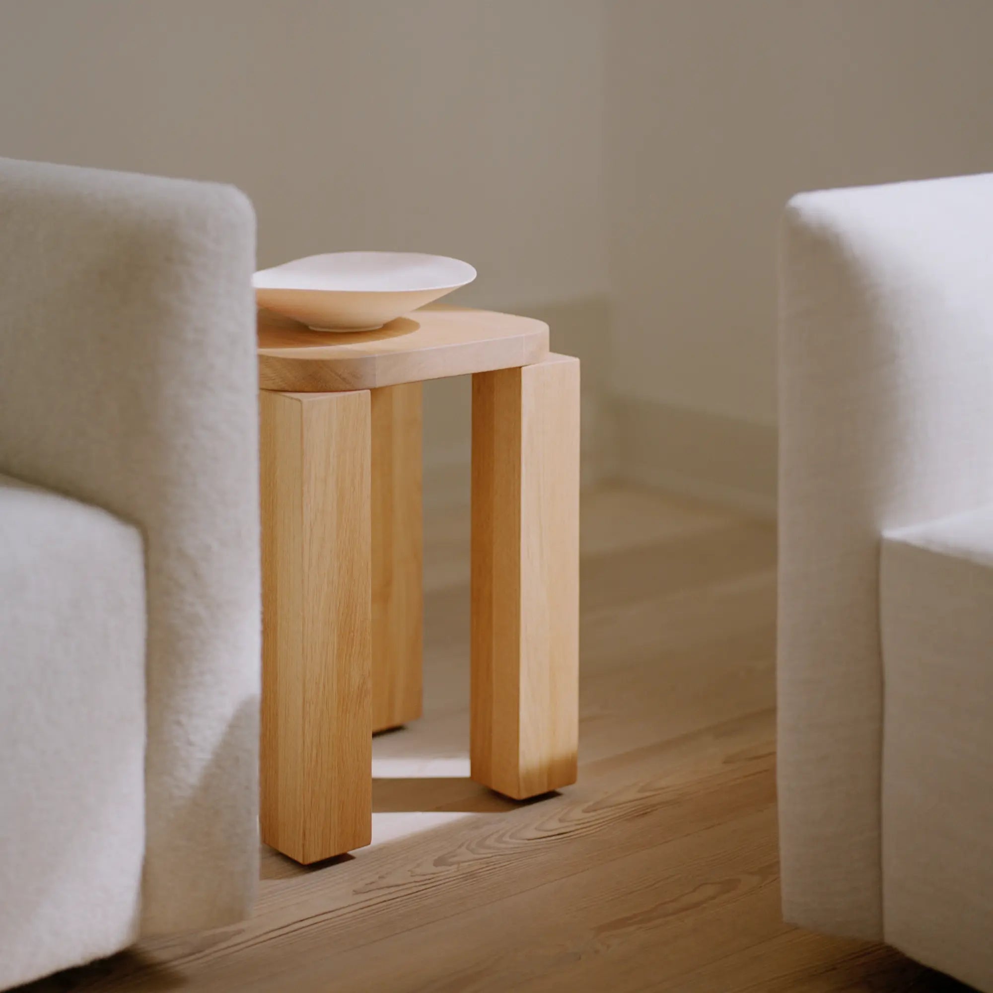  Side view of the Atlas Stool showcasing its modern and minimalist design