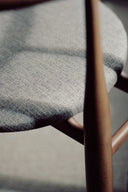 Bukowski Chair in sophisticated navy blue leather with classic button tufting
