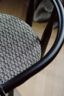 Elegant Bukowski Chair with rattan construction and natural finish