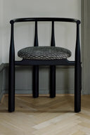 Modern and ergonomic Bukowski chair with sleek design and comfortable cushioning