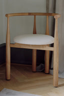 Bukowski Chair in classic black leather with comfortable cushioning