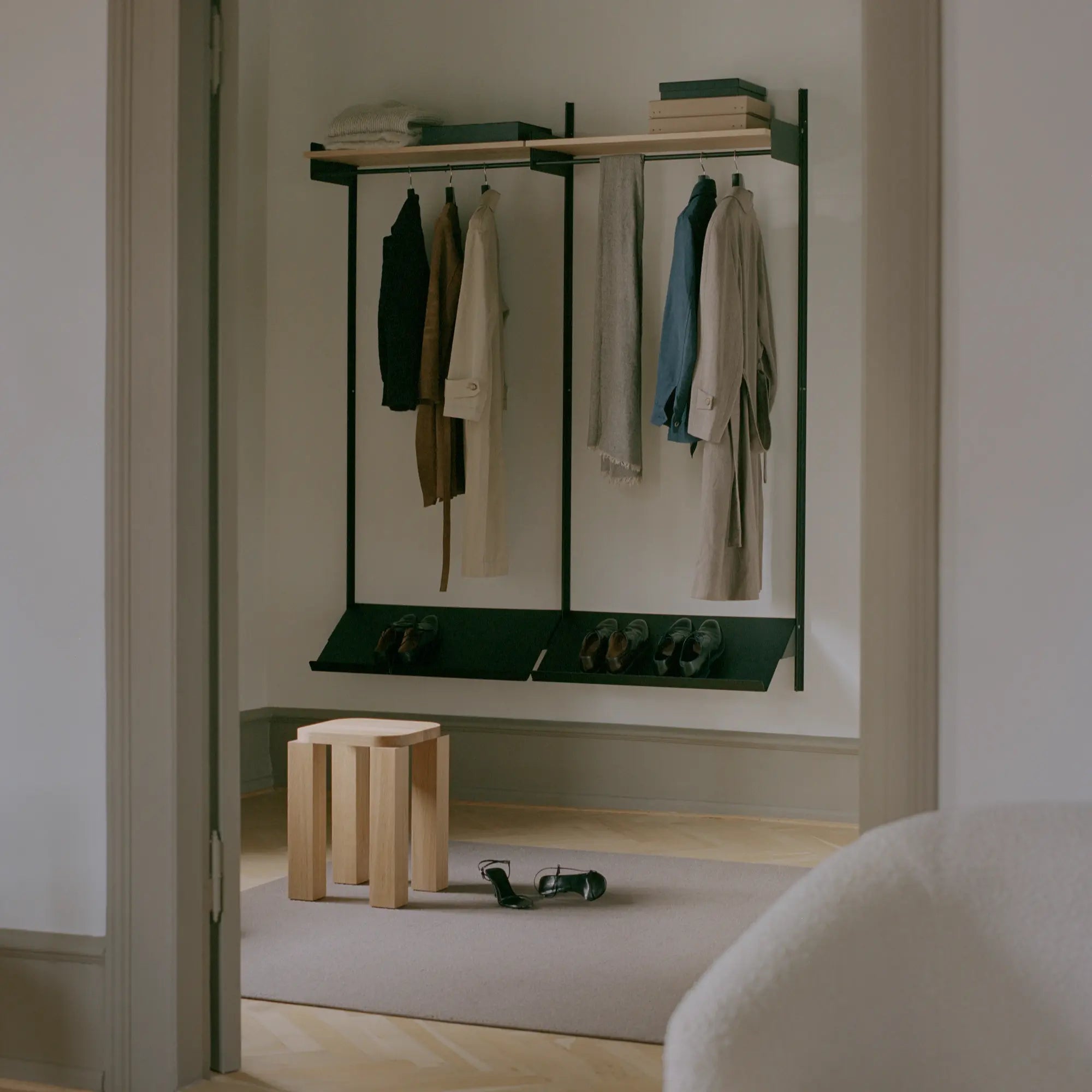 Beautiful and sturdy Atlas Stool with a sleek wooden design and comfortable cushioned seat