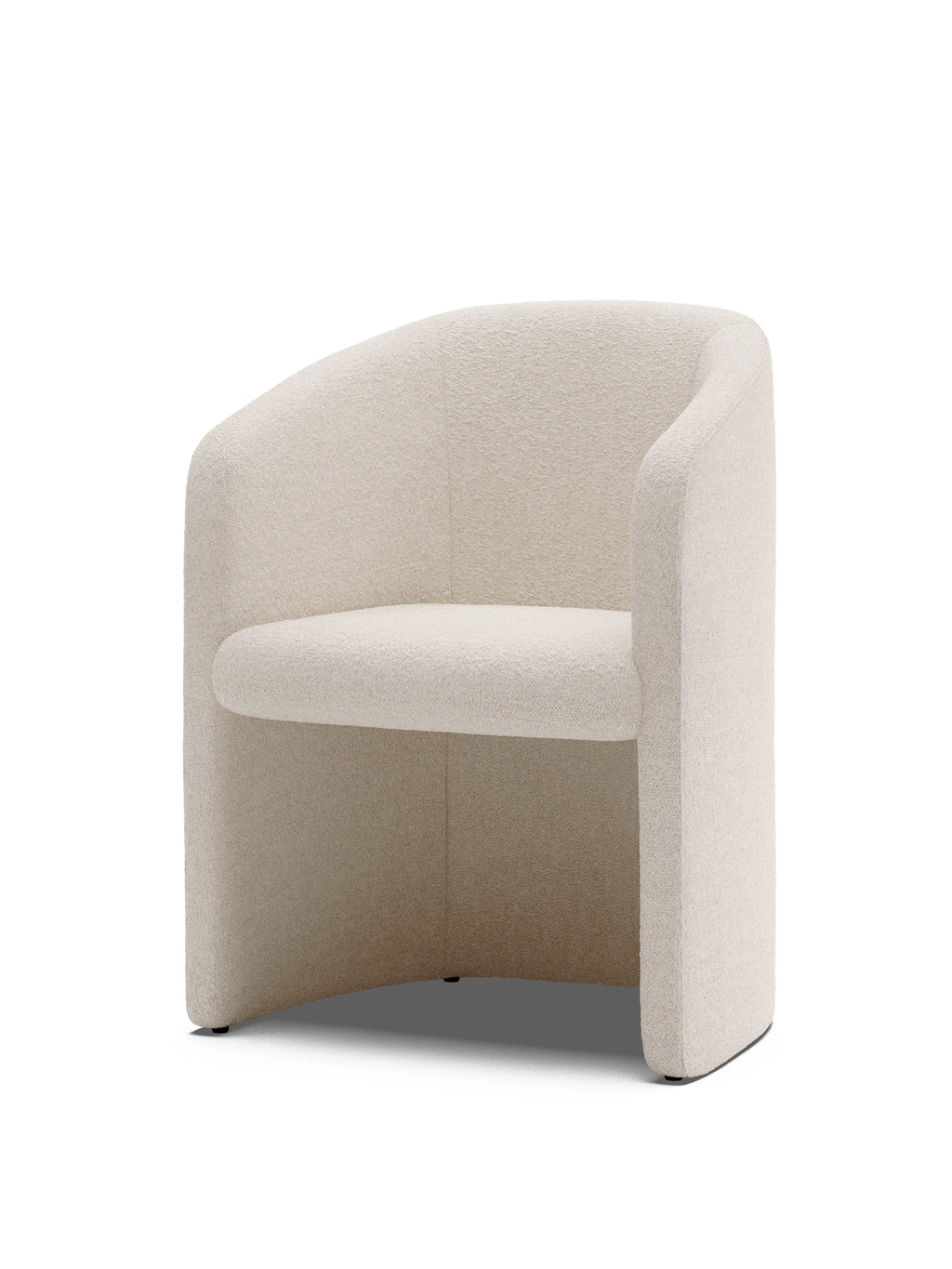 New Works Covent Club Chair in a soft, textured off-white bouclé fabric, featuring a rounded backrest, integrated armrests, and a low profile. This premium, contemporary club chair is ideal for modern living spaces.