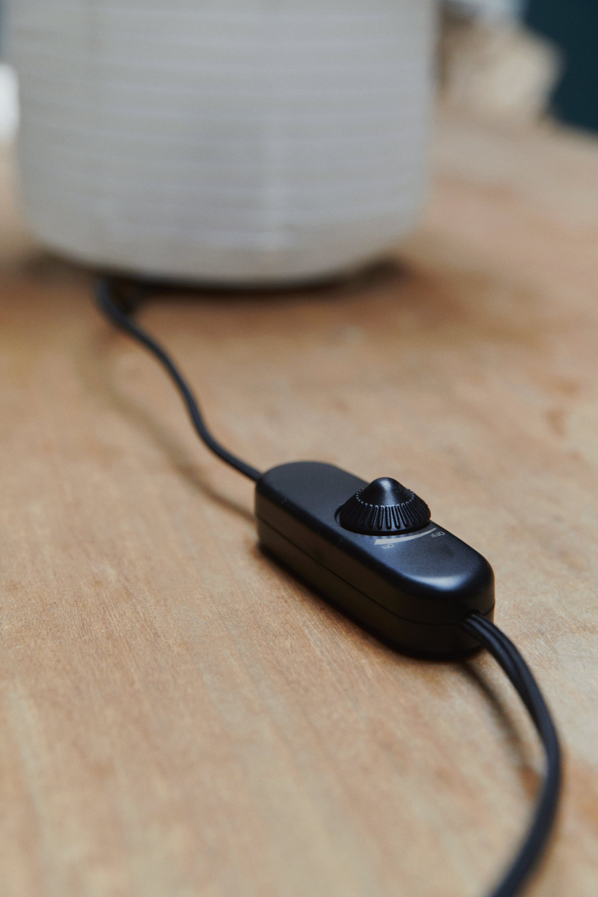 Made by Hand Papier Double Ø30 Table Lamp, featuring a sleek black inline dimmer switch with a ribbed knob and matching black power cord, designed for adjustable brightness.