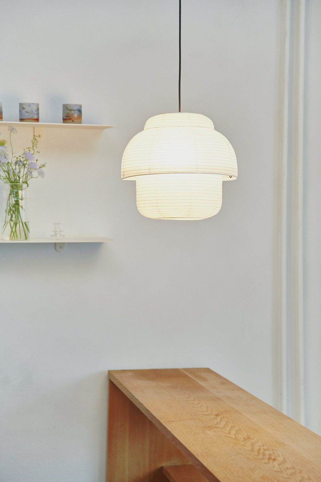 Made by Hand Papier Double Ø40 Pendant Lamp, a Scandinavian-inspired double-tiered pendant lamp crafted from natural cream-colored rice paper with a delicate ribbed texture and soft, diffused glow. This organic modern ceiling light creates a serene ambiance, perfect for Japandi living rooms, minimalist dining areas, or cozy bedroom accents.