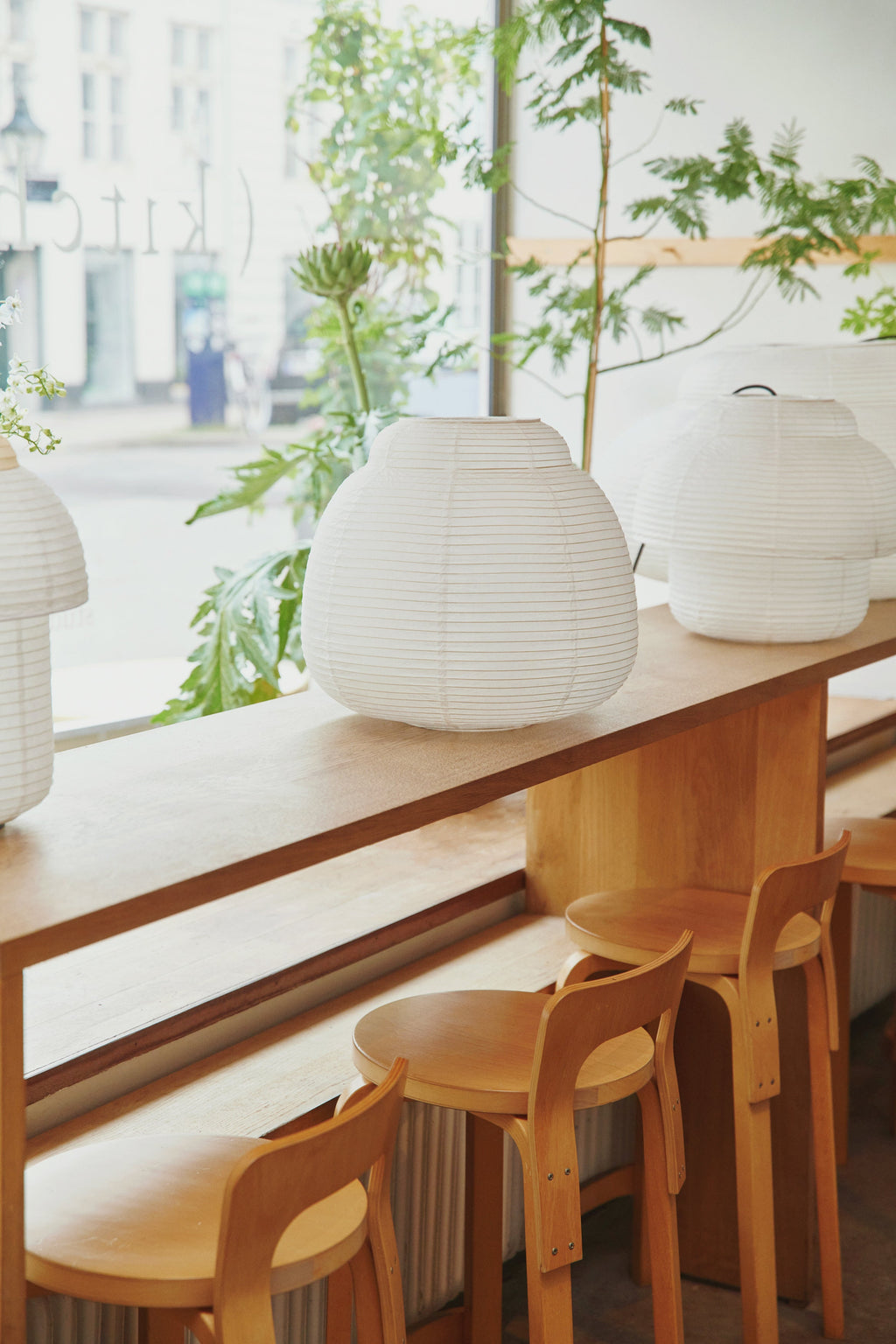 Made by Hand Papier Single Ø40 Pendant Lamp, an organic modern pendant light crafted from off-white ribbed paper, featuring a voluminous, irregular gourd-like silhouette.