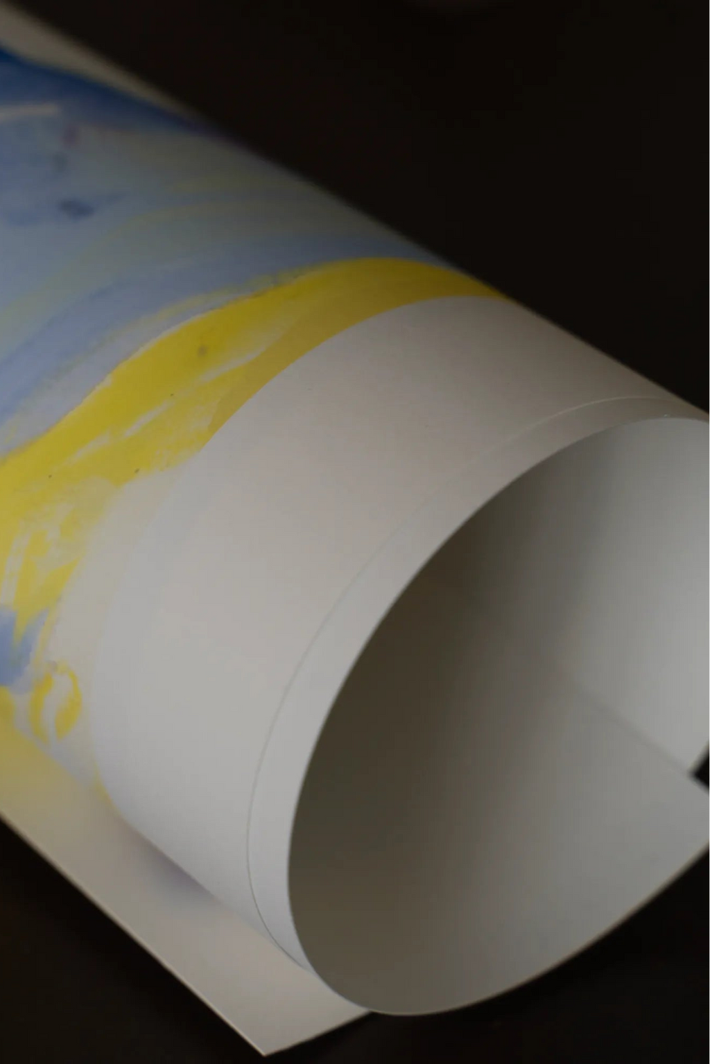 The Poster Club Blue Strokes, an abstract art print showcasing sweeping blue and vibrant yellow watercolor-style brushstrokes against a clean white background, printed on high-quality matte poster paper.