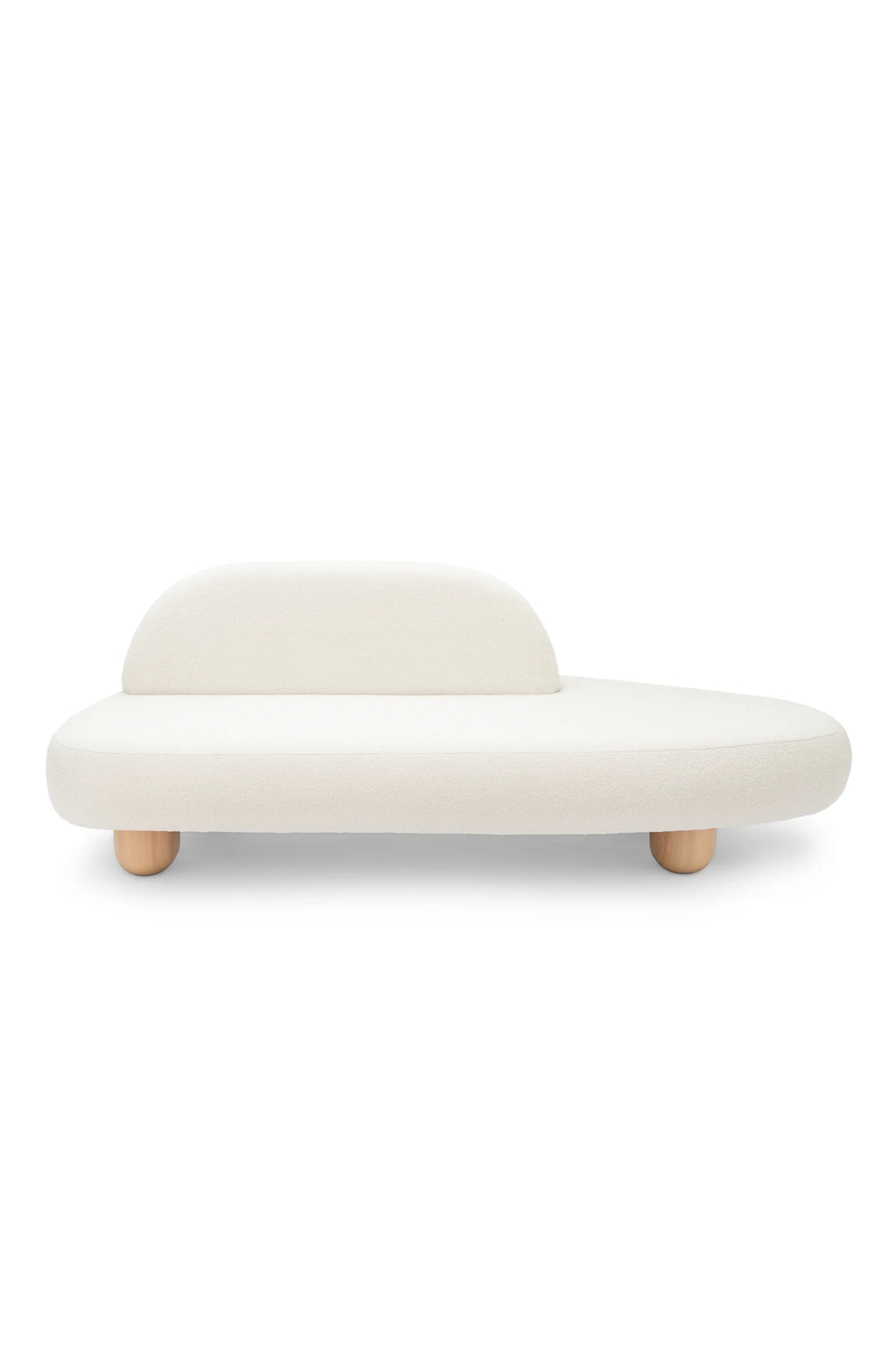 NG DESIGN Object 047 Sofa, a modern off-white bouclé upholstered organic-shaped futon with light wooden spherical feet, shot on a white background. Perfect for a contemporary living space.