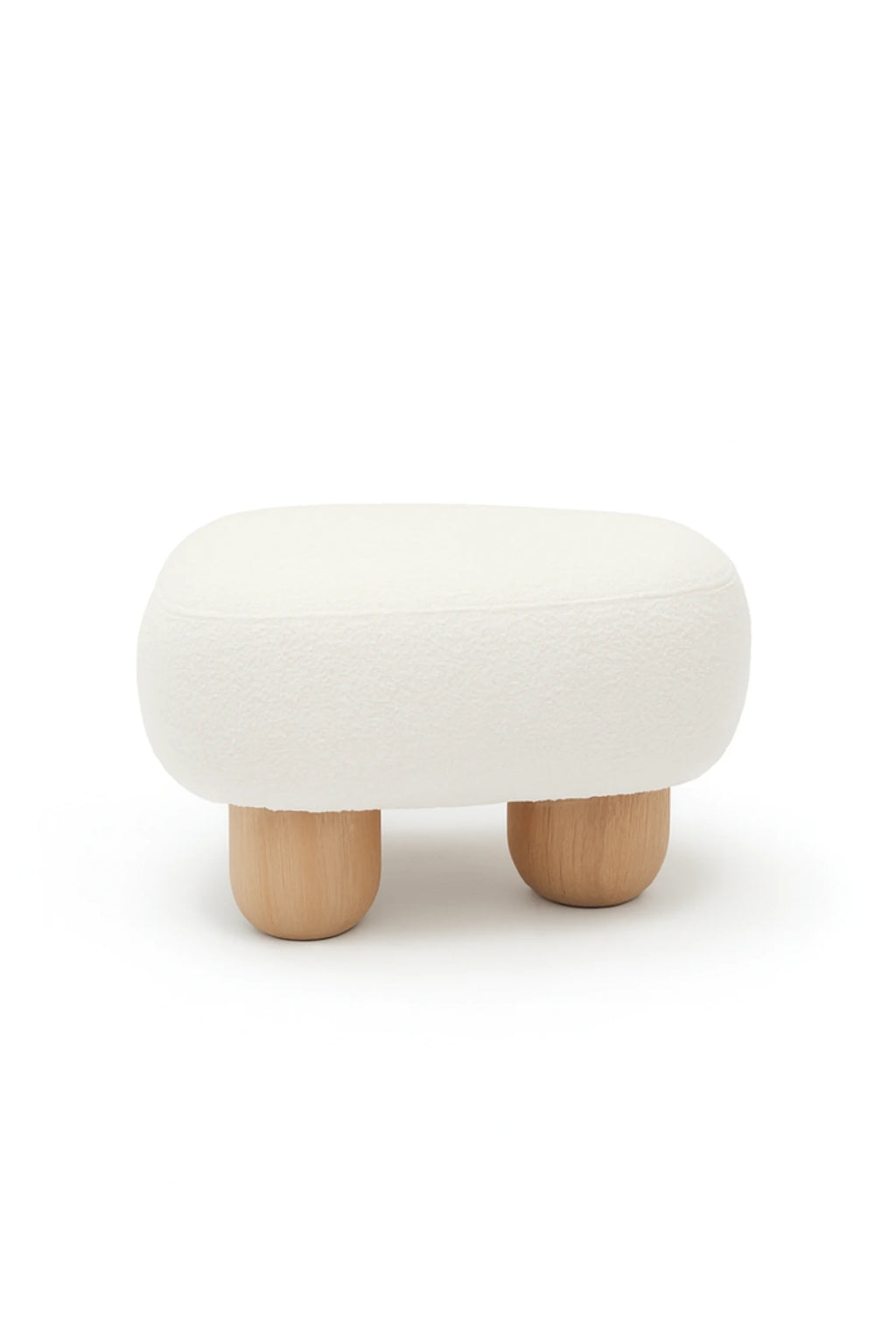 NG DESIGN Object 049 Pouf: A modern, rectangular off-white boucle pouf with rounded corners, resting on four short, light wood mushroom-shaped legs. A sophisticated, premium accent for any living space.