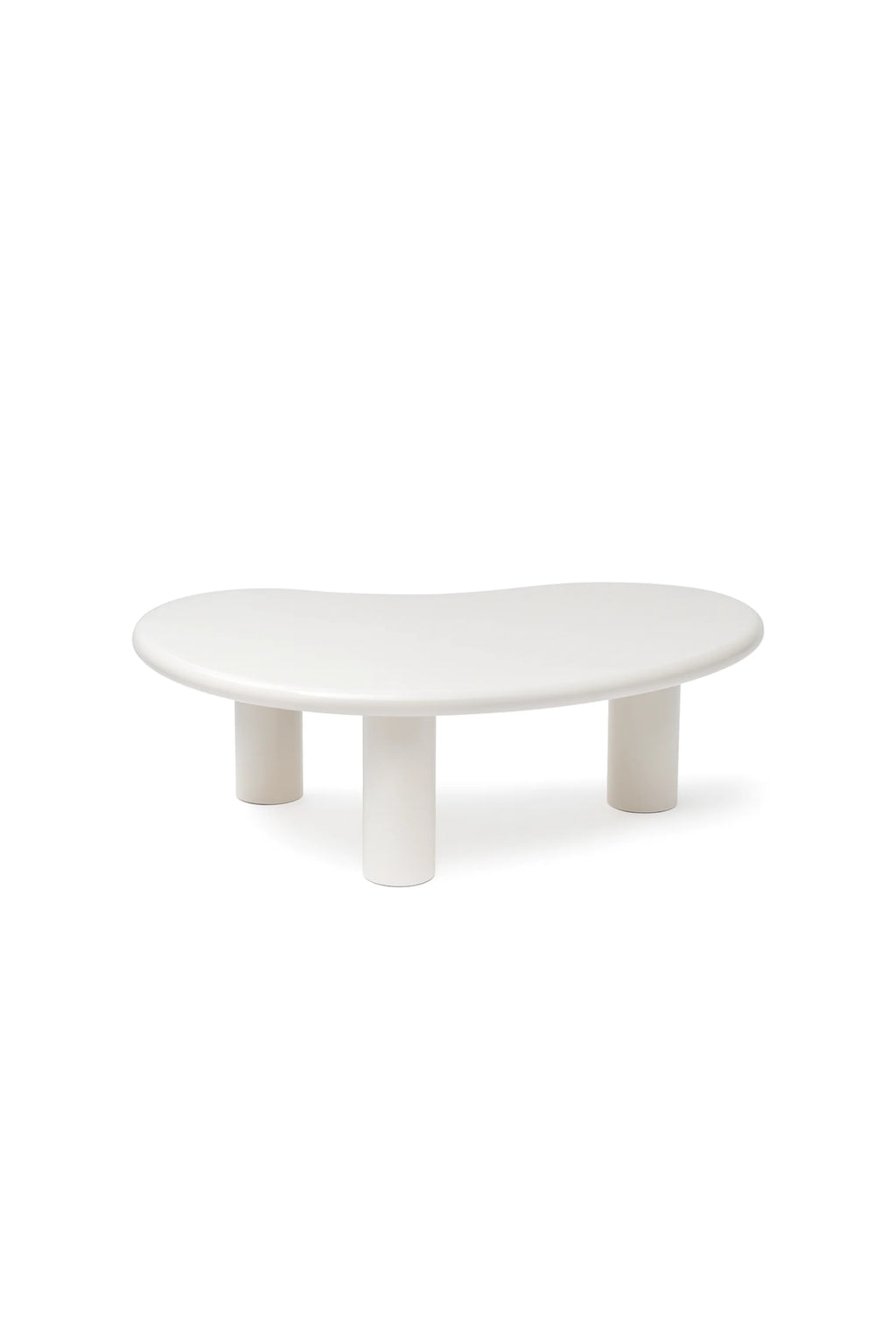 NG DESIGN Object 061 Coffee Table in a studio shot. This unique contemporary piece features a light cream, kidney-bean-shaped top with three sturdy cylindrical legs. It's a luxury statement for modern living spaces.