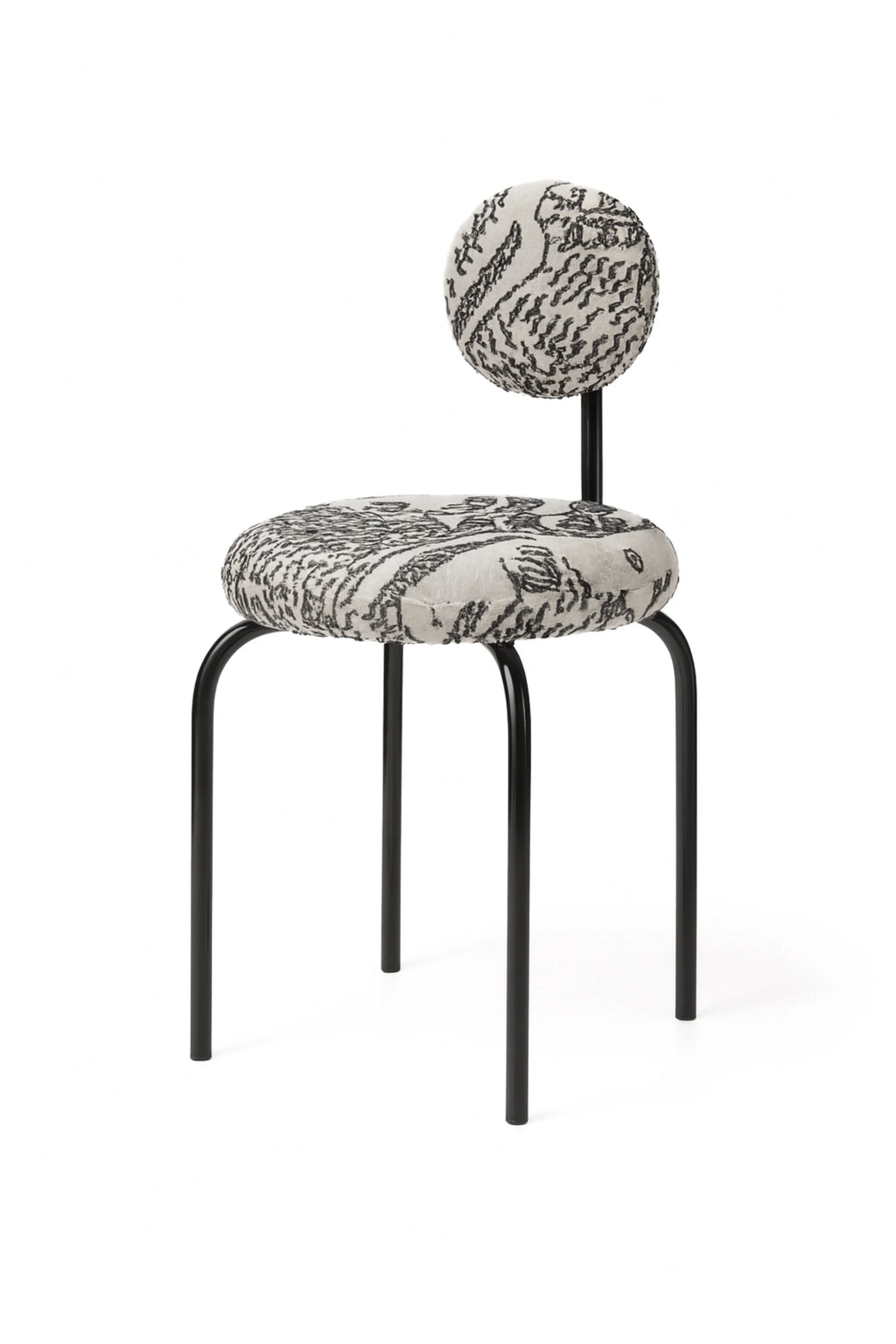 NG DESIGN Object 077 Chair, featuring a rounded backrest and seat upholstered in off-white fabric with an intricate black abstract pattern, on a sleek black metal frame. A luxury occasional chair for modern interiors.