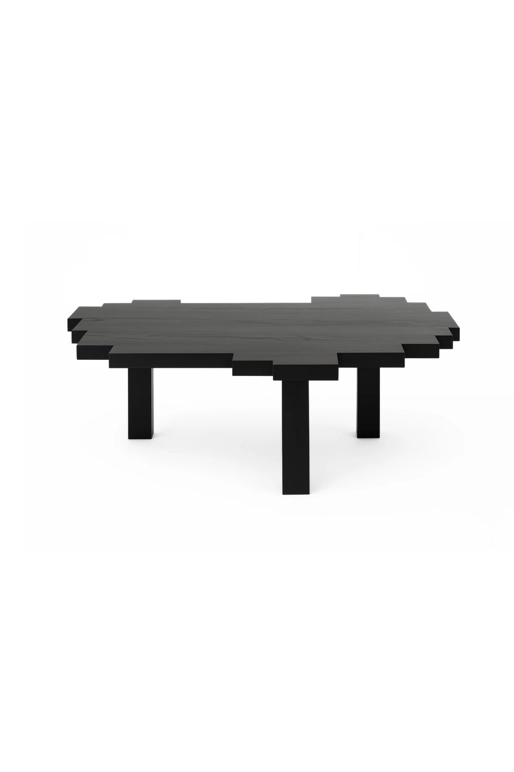 NG DESIGN Object 116 Coffee Table, a modern black wooden pixelated low-profile table with sturdy block legs on a white background. This luxury centerpiece is perfect for contemporary living spaces.
