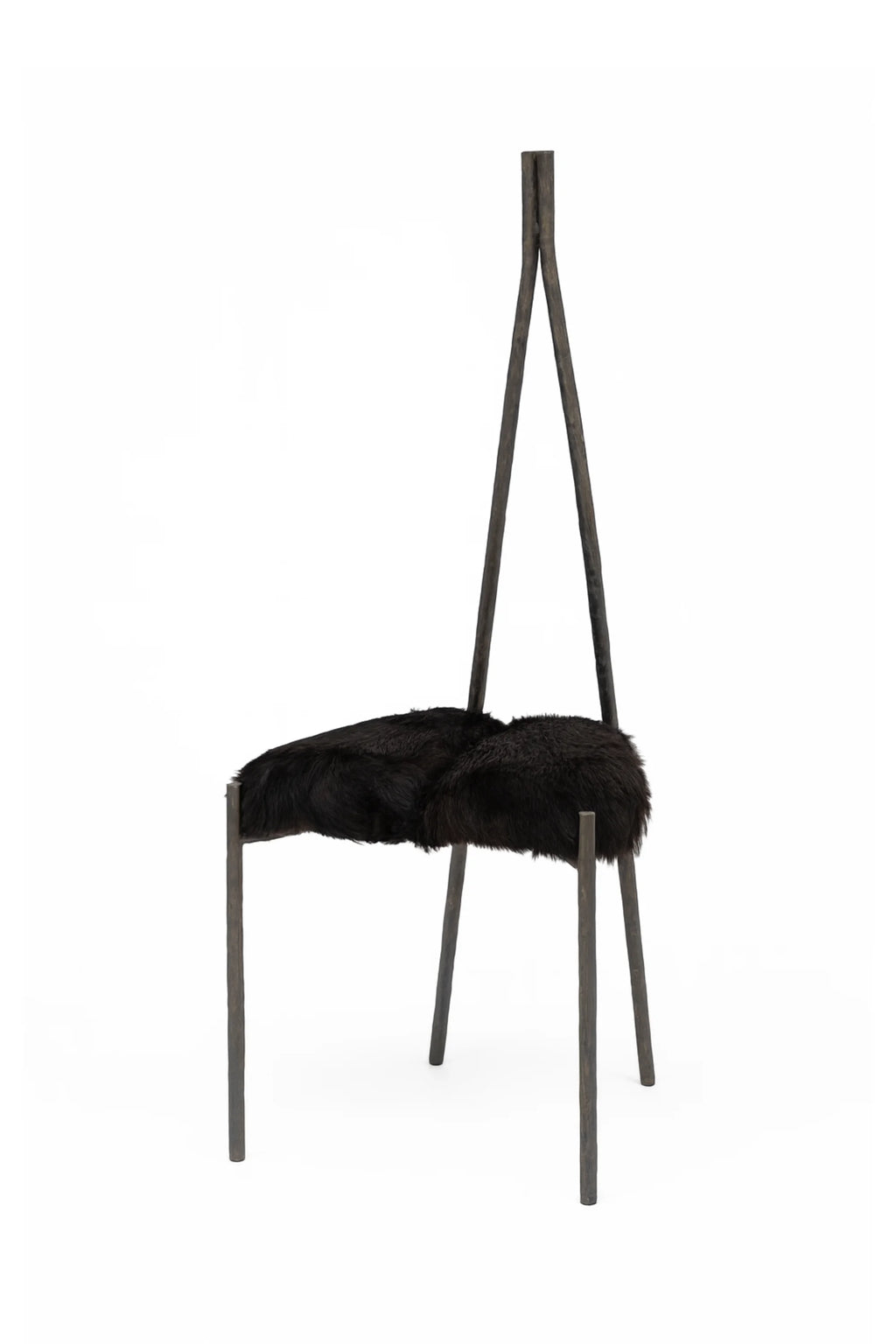 NG DESIGN Object 117 Chair, featuring a luxurious black fur seat and a tall, unique matte dark bronze metal frame with an easel-like backrest on a white background. Ideal for modern, artistic interiors.