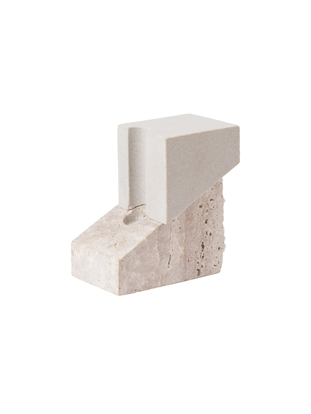 Kristina Dam Offset Candleholder Vol. 1, a sculptural modern minimalist candle holder crafted from two contrasting natural stones in light beige and sandy cream tones. It features a smooth, finely textured sandstone-like top block with an offset geometric form, resting on a rough, porous travertine base. This brutalist-inspired decorative object is perfect for contemporary shelf styling or as a unique centerpiece in organic modern living rooms.
