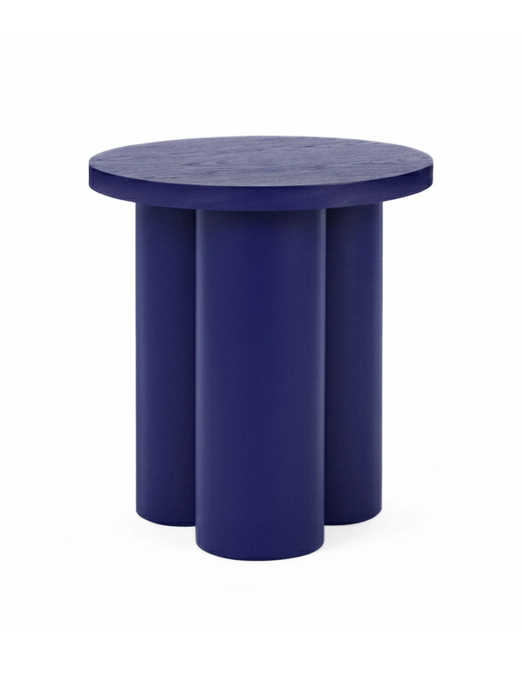 noo.ma Oly Stool, a modern minimalist side table crafted from painted solid wood in a vibrant navy blue finish, featuring a clean round tabletop and three sturdy cylindrical legs.