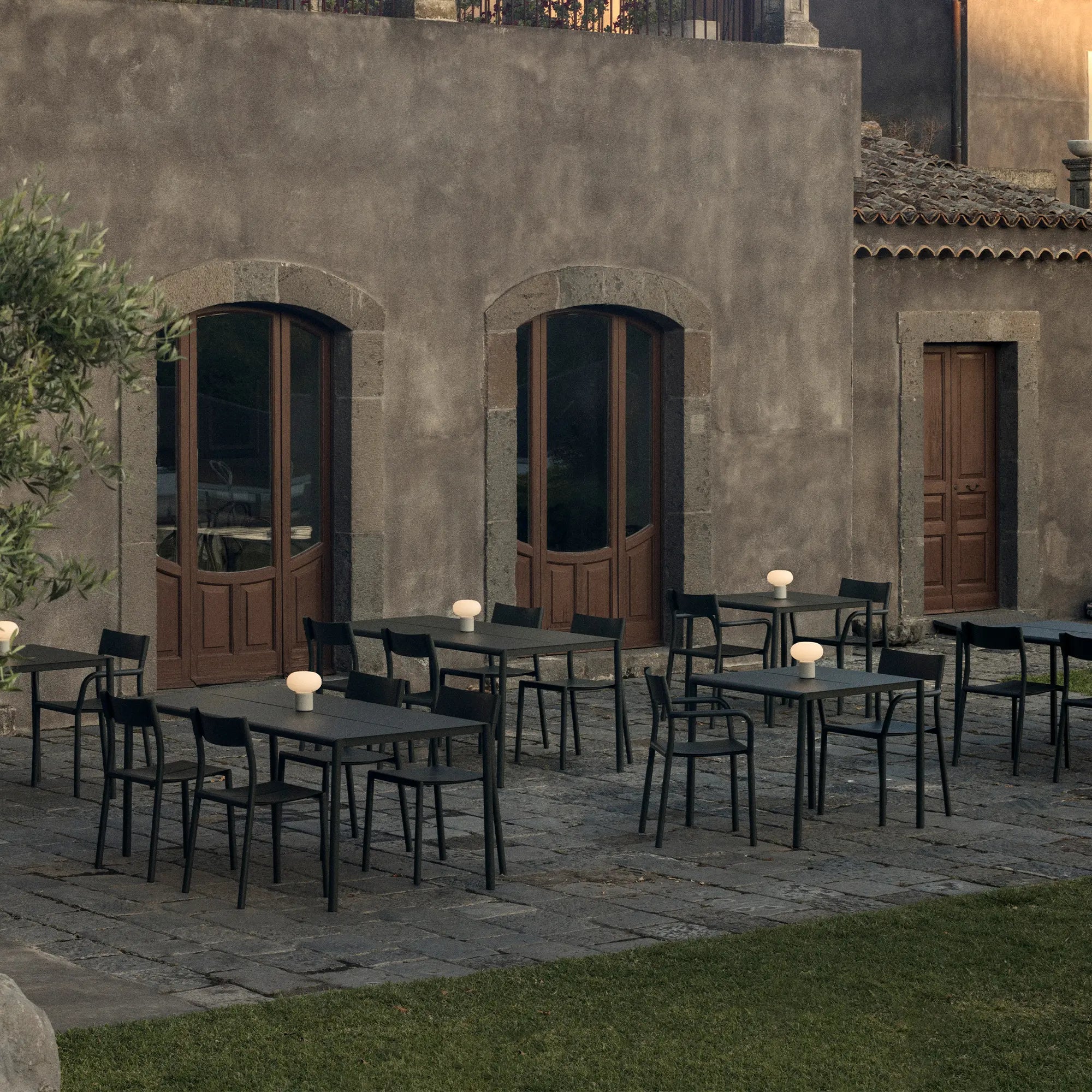 Outdoor may table made of weather-resistant materials for durability in all seasons