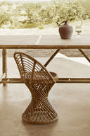 Two stylish and durable rattan chairs for outdoor relaxation