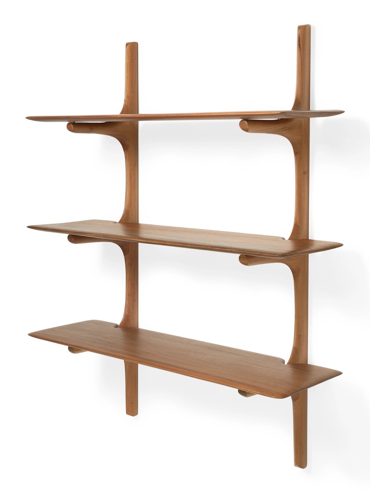 Ethnicraft PI Wall Shelf, a sculptural mid-century modern wall shelving unit crafted from warm brown solid wood with a smooth, natural finish.