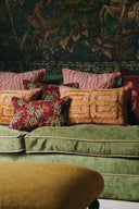 Cleo Cushion featuring a unique hand-painted design in earthy tones