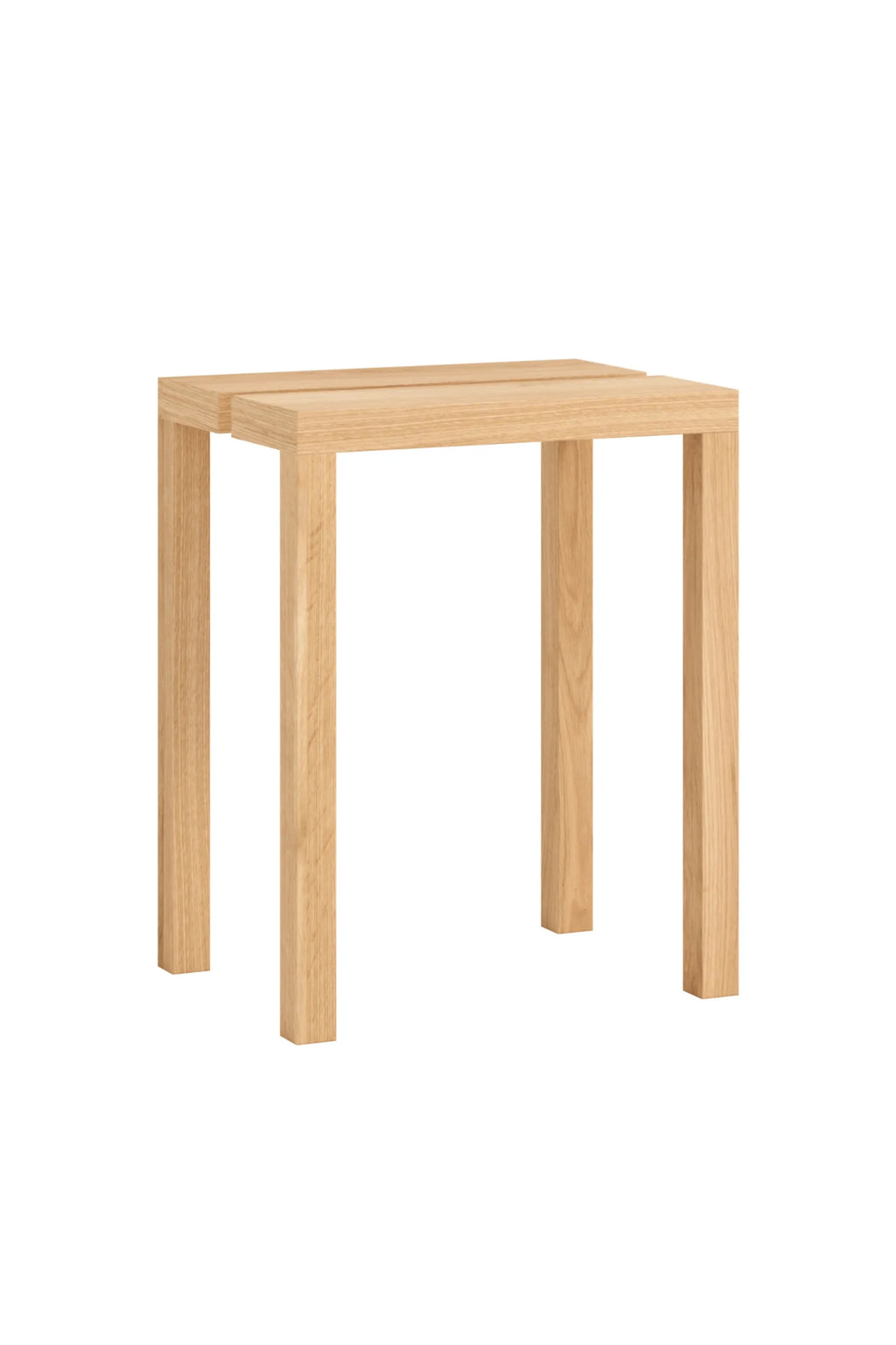 MOEBE Peg Stool, a modern minimalist stool crafted from natural solid oak wood, featuring a light finish with visible grain and a clean, rectangular silhouette with a distinct two-plank top and straight legs. This versatile solid oak accent stool is perfect as a contemporary bedside table or Scandinavian side table for living rooms and bedrooms.