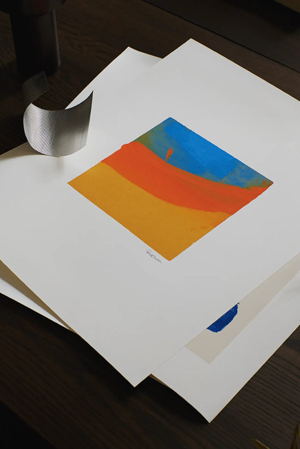 The Poster Club Sunset Wave, a vibrant abstract art print featuring bold painterly brushstrokes in warm orange and golden yellow tones, topped with a striking band of bright blue, creating a contemporary diamond-shaped composition. This colorful modern poster is perfect as impactful wall art for a living room, bedroom, or a curated gallery wall in modern minimalist interiors.