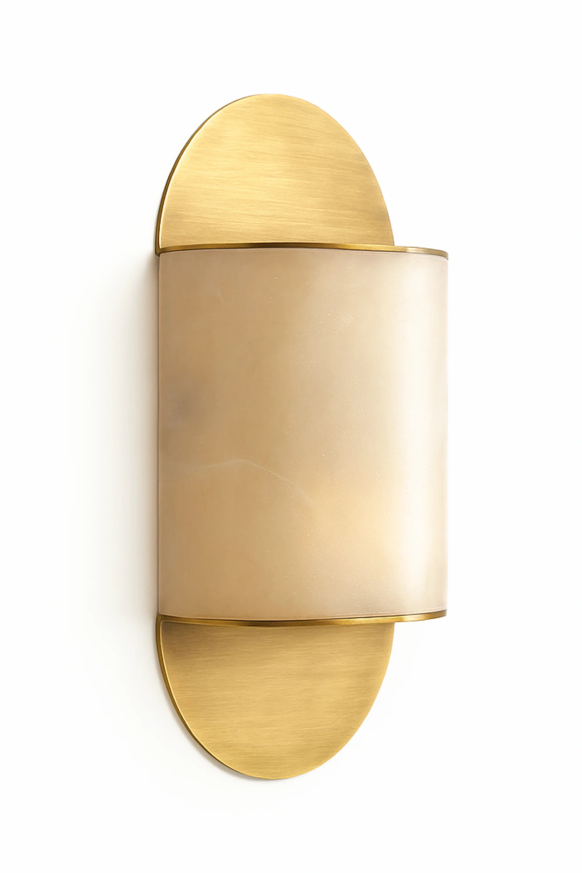 Gold wall sconce with a white shade on a white background