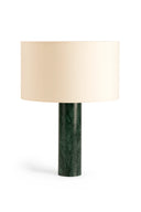 Table lamp with a green marble base and beige lampshade on a white background
