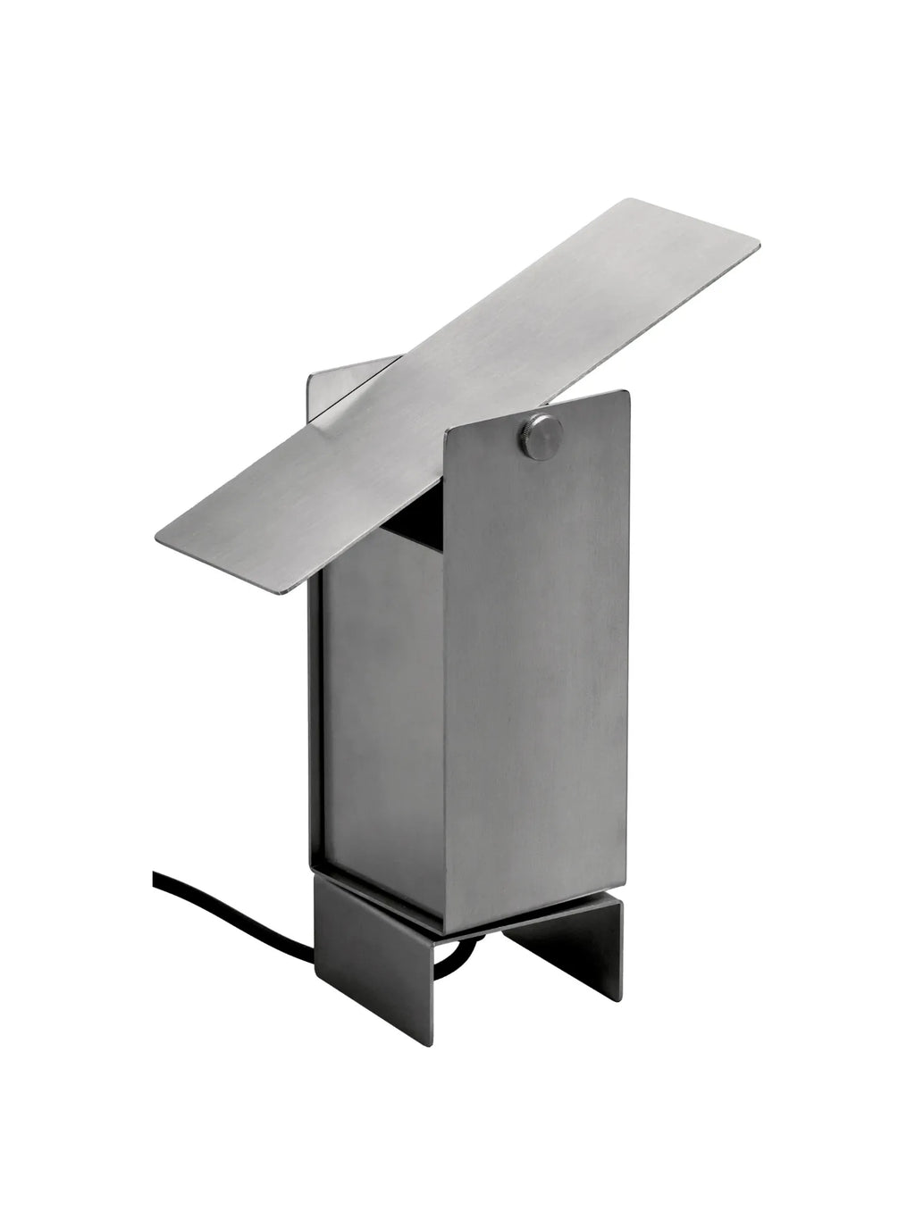 MOEBE Pivoting Table Lamp, an industrial chic desk lamp crafted from brushed stainless steel with a clean, geometric form and a functional pivoting shade. This modern minimalist design offers adjustable accent lighting and a raw, architectural aesthetic. Perfect for a contemporary home office, brutalist-inspired living room, or as a striking bedside table lamp.