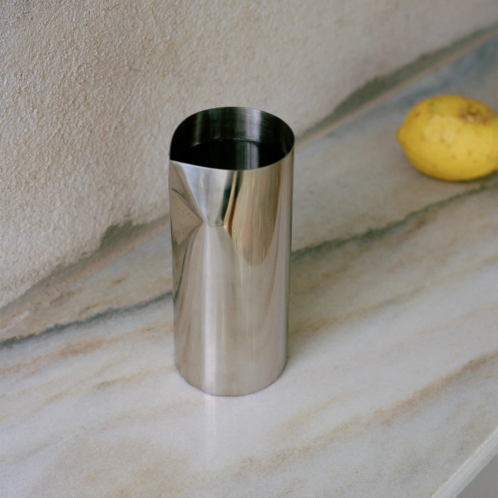 Pleat Pitcher with lid off, showing wide mouth for easy filling and cleaning