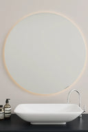 Large round mirror with illuminated border for a luxurious look