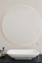 Large round mirror with illuminated border for a luxurious look