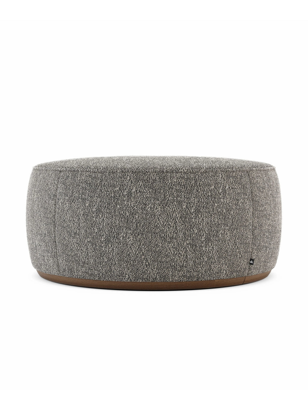 Domkapa Rachel Ottoman, a contemporary round ottoman upholstered in a rich grey heathered woven fabric with a subtle texture, featuring a plump, low-profile cylindrical shape and a sleek dark wood base. This versatile accent pouf is perfect for organic modern living rooms, minimalist bedrooms, or stylish entryways, offering both comfort and modern design.